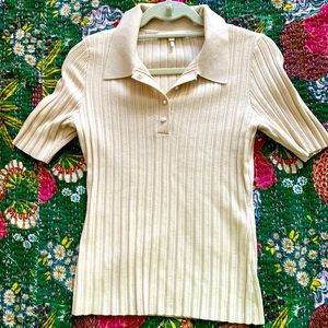 Beige knit polo with pearl buttons